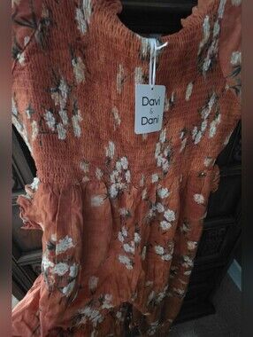 2X Burnt Orange/Rust Colored Romper w/cream Colored Floral Throughout.